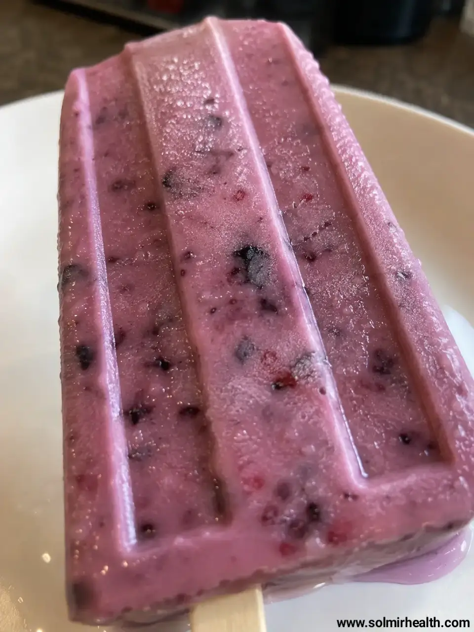 greek yogurt berry popsicle close up