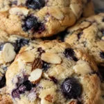 Blueberry almond protein cookies topped with sliced almonds
