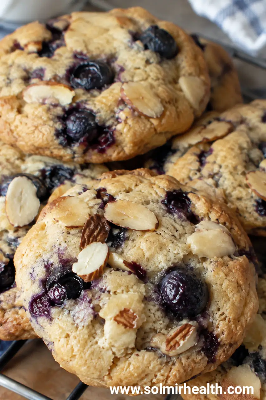 Blueberry almond protein cookies topped with sliced almonds