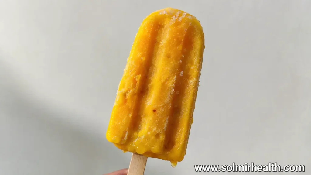 Homemade mango fruit popsicle, healthy summer treat