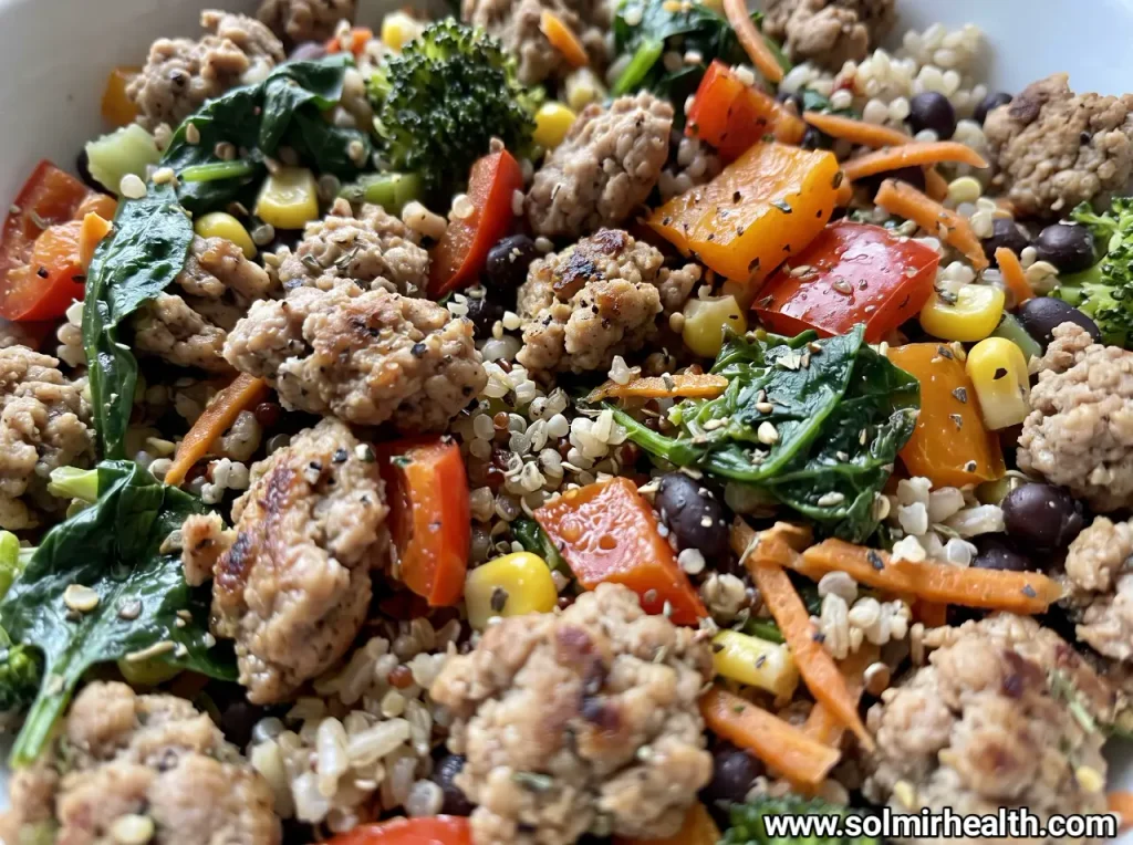 Turkey veggie bowl with ground turkey, broccoli, diced bell pepper, avocado and melted cheddar